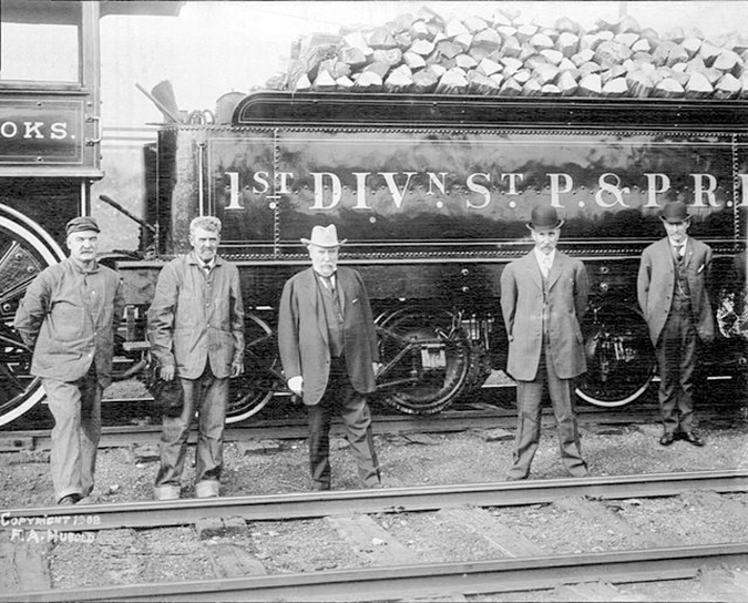 James J. Hill, center James J. Hill, center